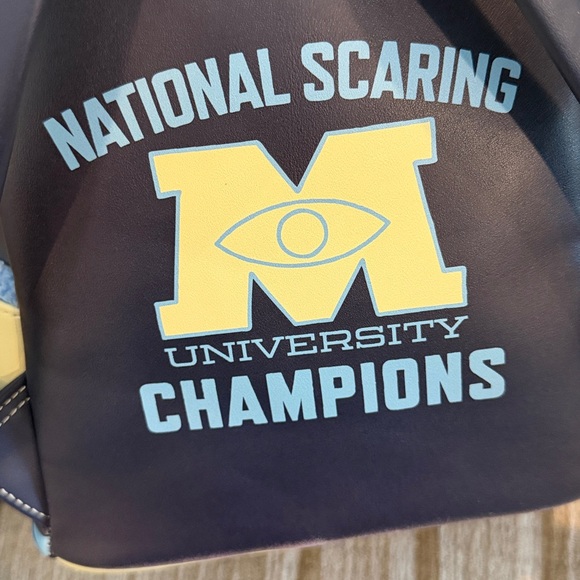 Disney Monsters University varsity jacket Navy and Cream Backpack 10 x 8 - Picture 7 of 10